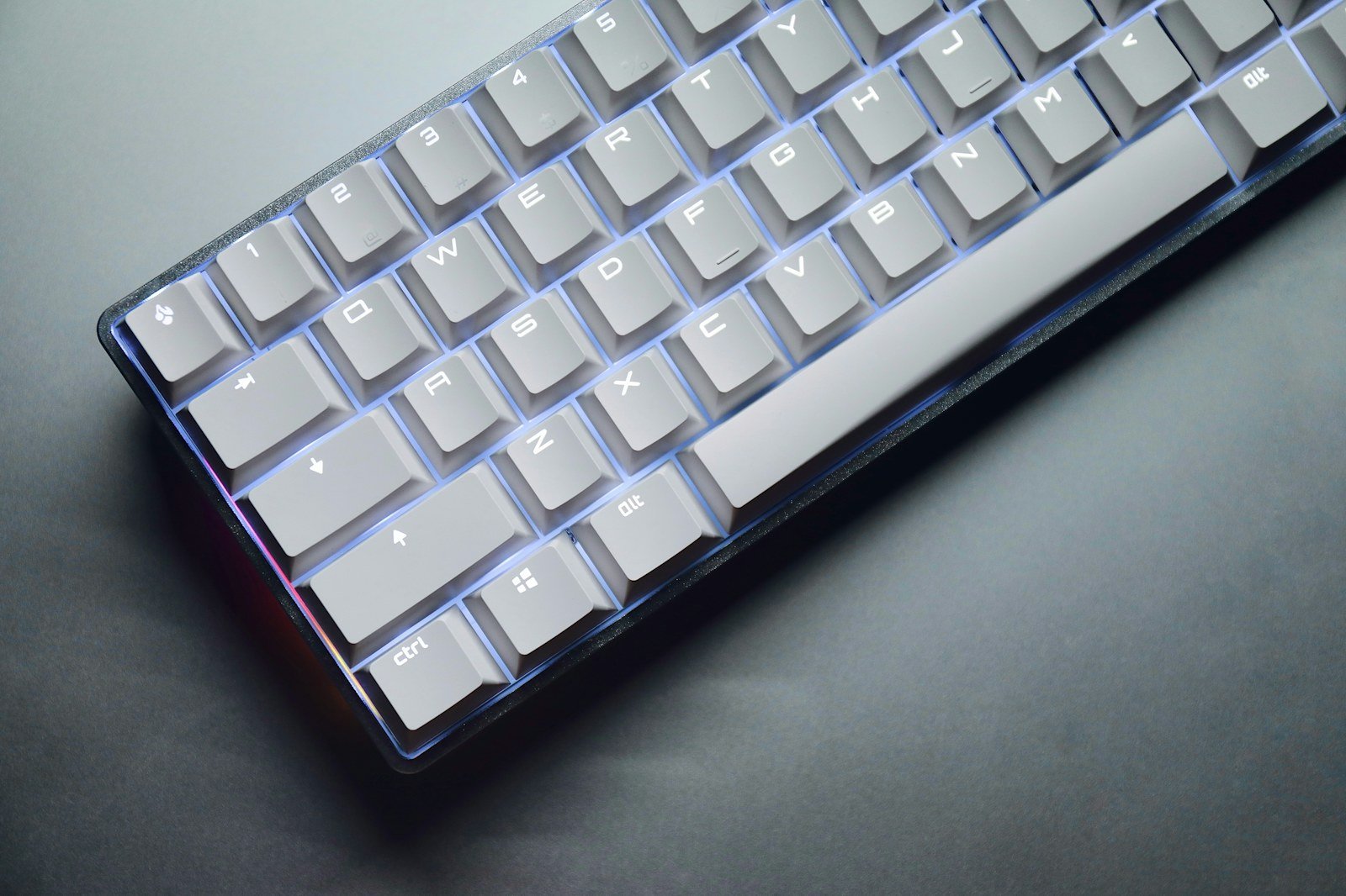 Close-up of a black mechanical keyboard and computer hardware